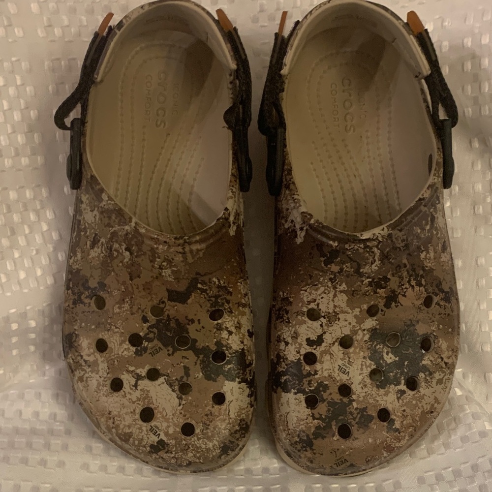 Camouflage unisex CROCS All-terrain, size 7 men’s and size 9, women’s.